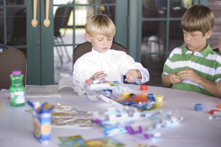 kids painting at a wedding